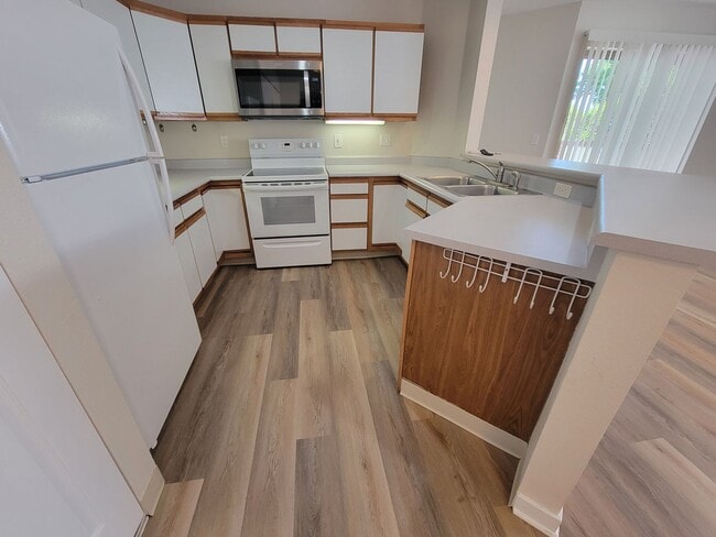 Building Photo - First Floor Two Bedroom Condo Available at...