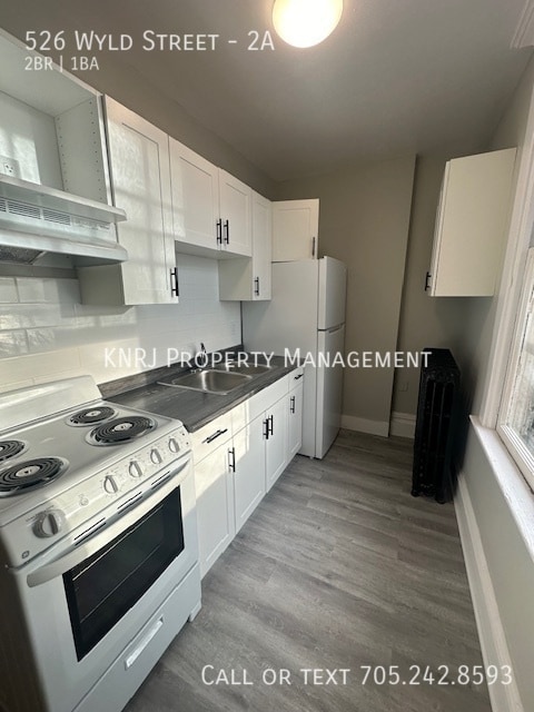 Building Photo - Two Bedroom Apartment (KNRJ PM)