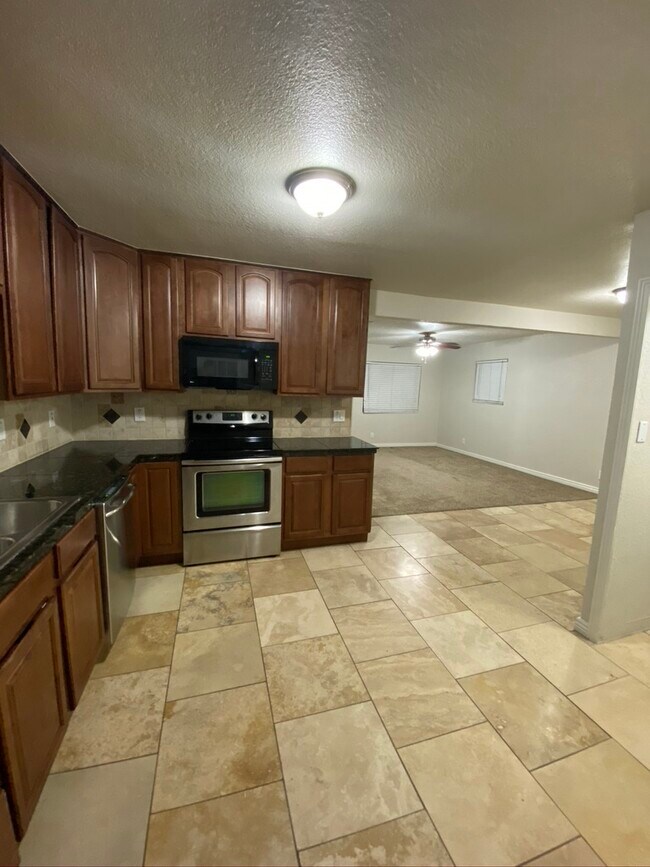 Building Photo - 2190 E 95th Ave