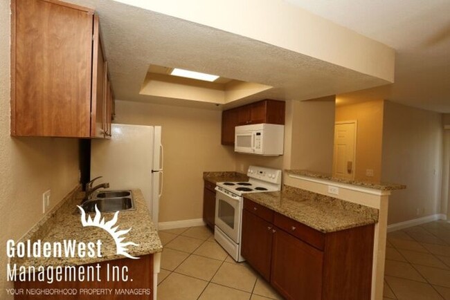 Building Photo - Cozy 1Bdm 1Ba Condo at Flamingo Palms Vill...