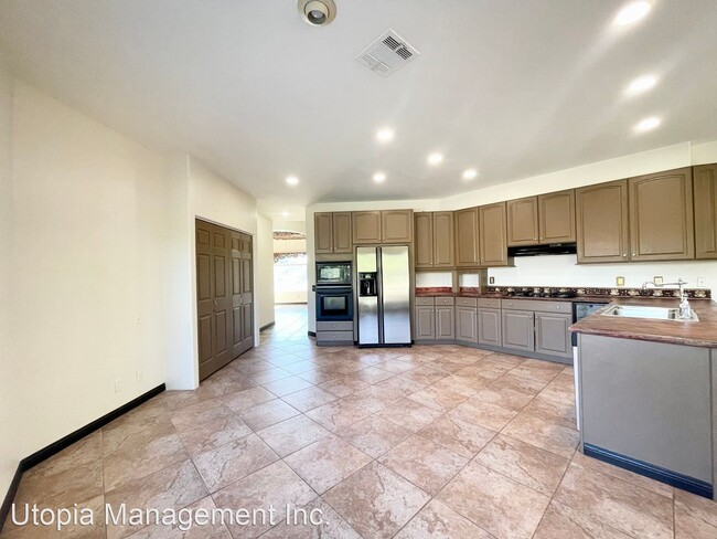 Building Photo - 4 br, 3 bath House - 38605 Desert Mirage