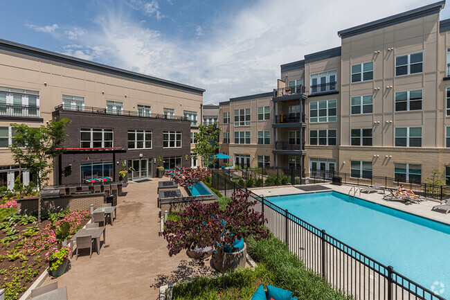 Our resort-style swimming pool features a sundeck and cabanas - Mallory Square