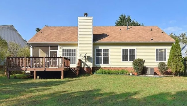 back of the house from yard - 3201 Gulfstream Ct