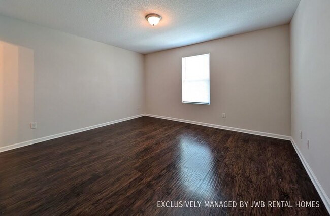 Building Photo - 8407 McGirts Village Ln