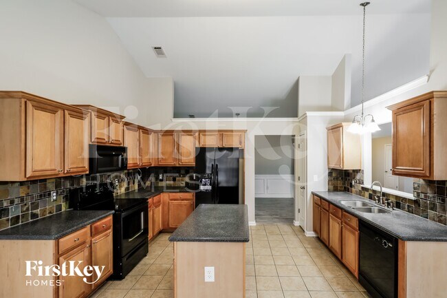 Foto del edificio - 6732 Carriage Walk Ln
