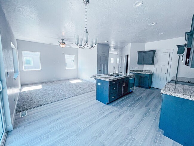 Building Photo - Brand New Idyllic END Unit Townhome in AF