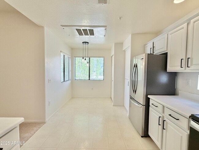 Building Photo - 9455 E Raintree Dr