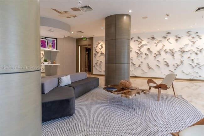Building Photo - 10275 Collins Ave