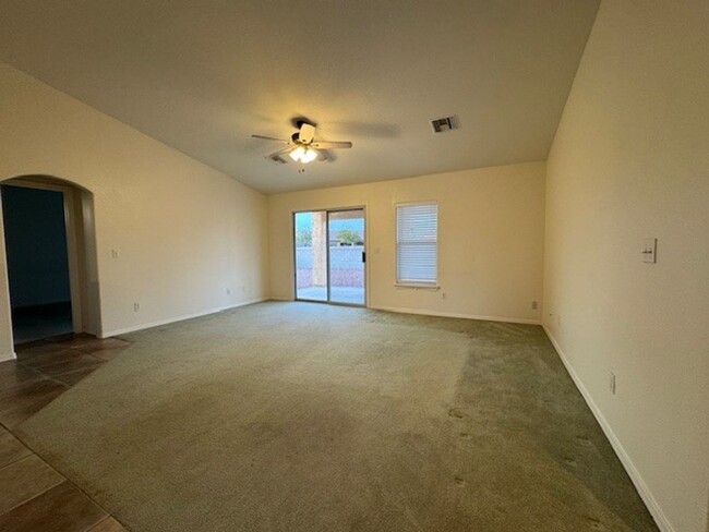 Building Photo - 3 BR with Boat deep Garage, Fenced Yard Bu...