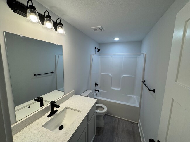 Building Photo - $1,850 - 4 bed 3 bath - Newer Build Duplex *COMING SOON*