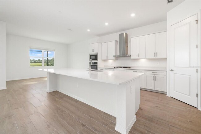 Building Photo - 5604 Lightning Whelk Ln