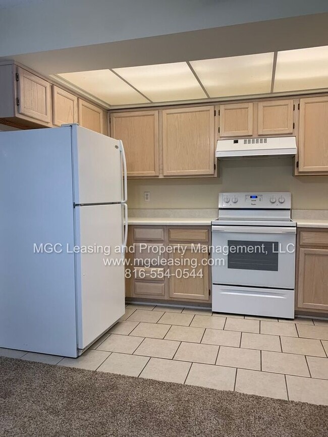 Building Photo - Welcome to Whispering Winds Townhomes – Wh...