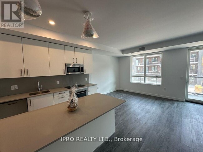 Building Photo - 217-7549 KALER Rd
