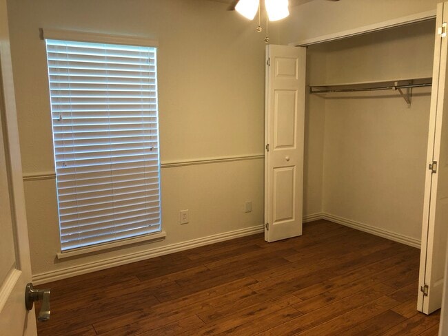 Bedroom 1 with large full wall closet. - 745 Meadow Mead Dr