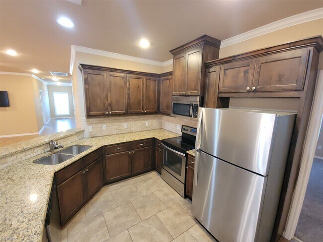 Foto del edificio - 4 br, 4 bath 4plex - 4168 Golden Eagle Dr A