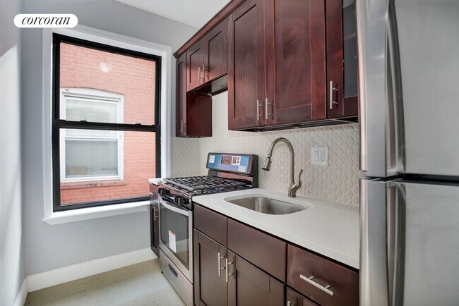 Building Photo - 25-40-40 99th St