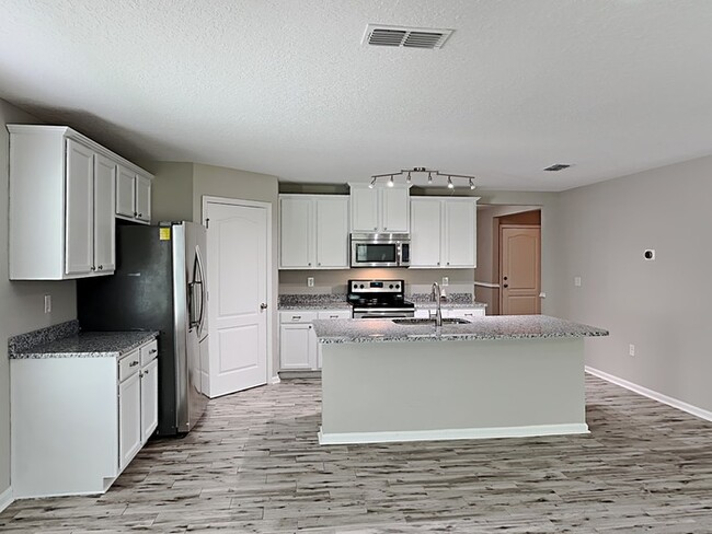 Building Photo - Magnolia West -GCS Home!!