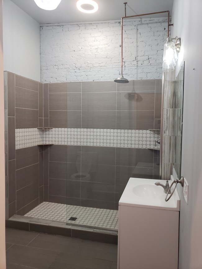 open and roomy shower - 116 S Saginaw St