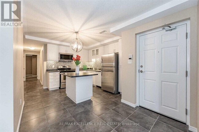 Photo du bâtiment - 1460 Highland Rd W