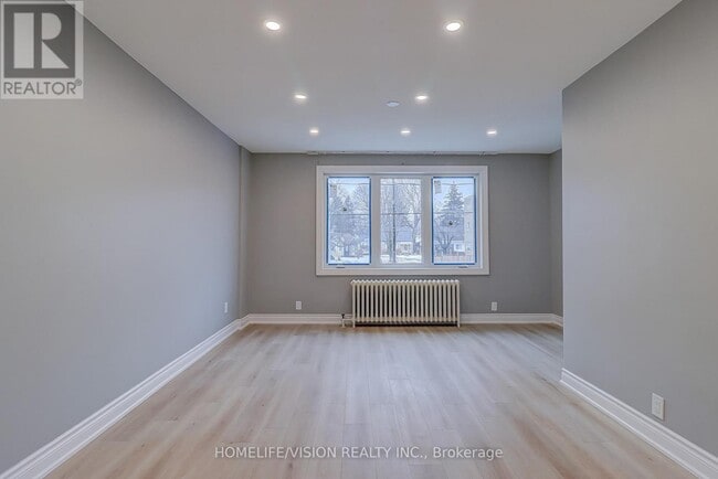 Building Photo - 2877 St Clair Ave E