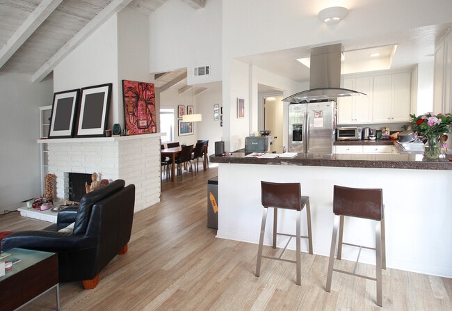 Open Living room, kitchen and dining areas - 431 Carnation Ave