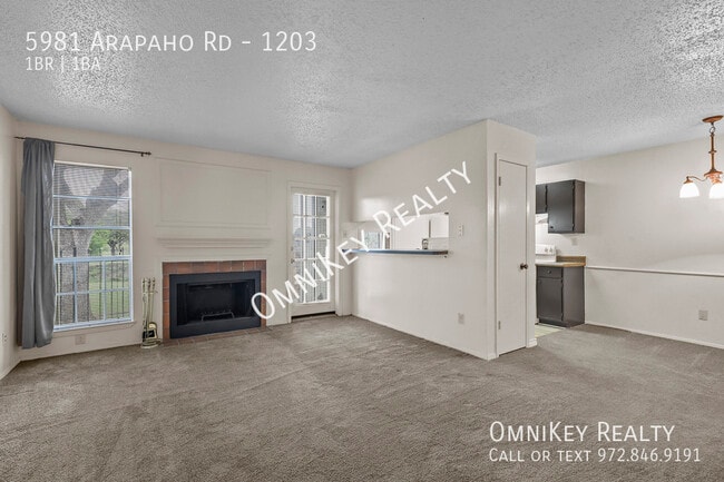 Building Photo - 5981 Arapaho Rd