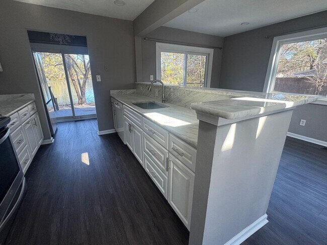 Building Photo - Waterfront Retreat with Private Dock & Sunroom Views