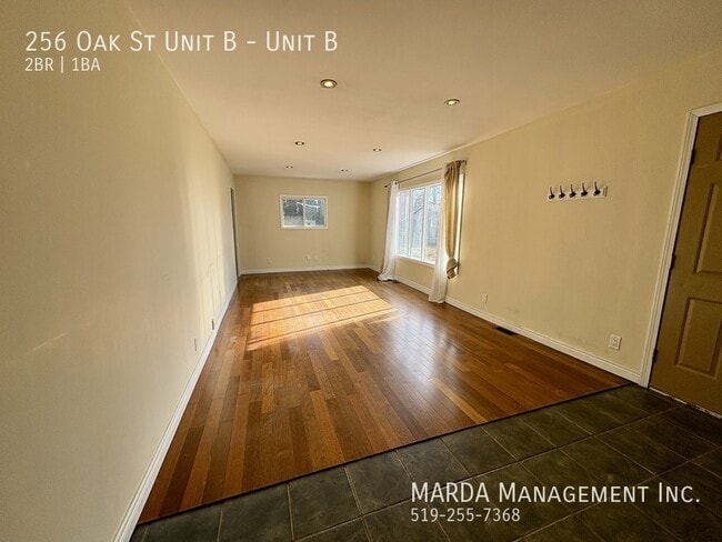 Building Photo - SPACIOUS 2 BED/1 BATH REAR UNIT WEST WINDSOR- ALL INCLUSIVE!!
