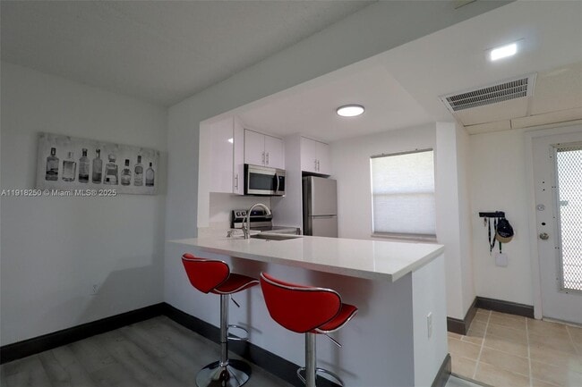 Building Photo - 9300 Lime Bay Blvd