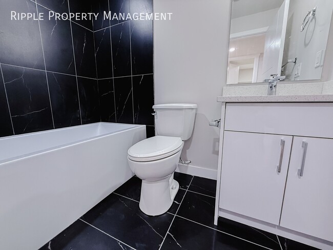 Building Photo - NEWLY RENOVATED 4 BEDS, 1 BATHS LOWER UNIT
