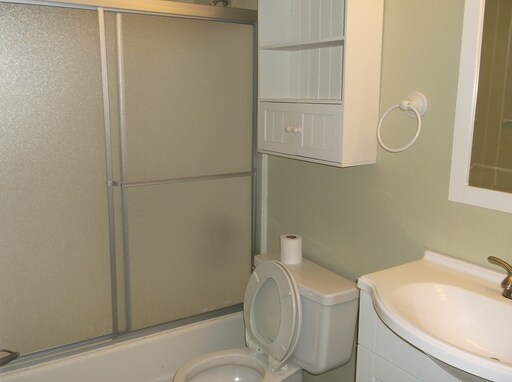 Building Photo - 3 BEDROOM, 1.5 BATHROOM TOWNHOUSE, 2 CAR D...