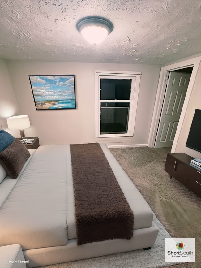 Building Photo - Updated 2 Bed 1 Bath upper level apartment in Lansing For Rent