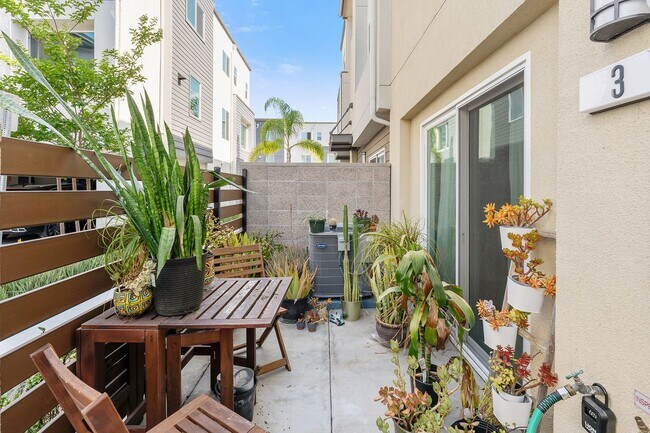 Building Photo - Modern Tri-Level Townhome in Gated Gardena Community with 2-Car Garag