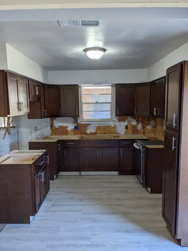 Kitchen is still under construction, will have a tile backsplash and granite countertops - 9510 Gov Beauvais Dr