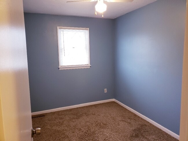 Third Bedroom with new paint, carpet and ceiling fan - 103 Hufnagle Dr