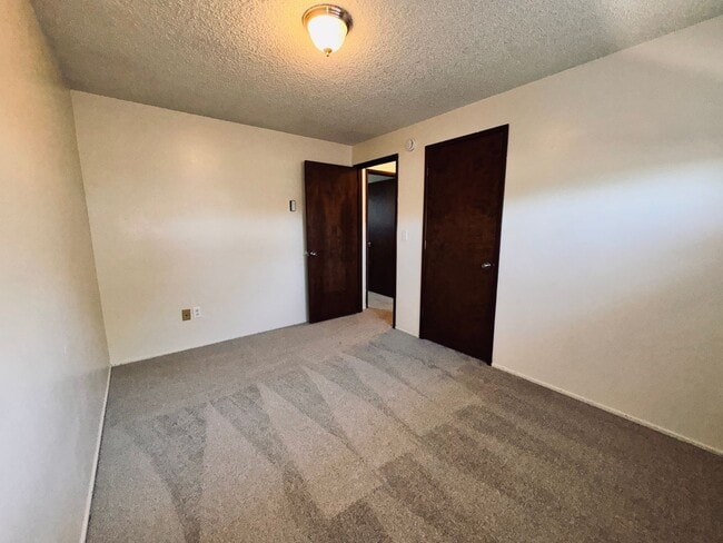 Building Photo - Single-Level 2 Bedroom / 1 Bath Triplex Unit on 1/2 Acre in East Bend  -  Move-In Special * up to...