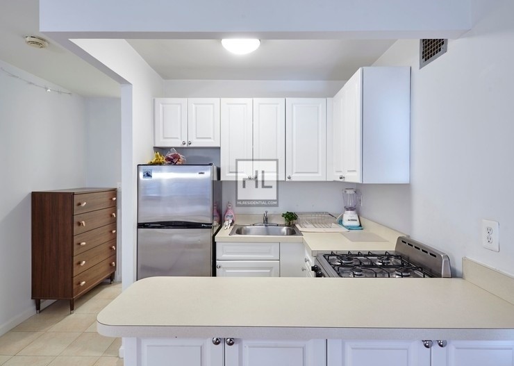 Foto del edificio - 210 E 22nd St
