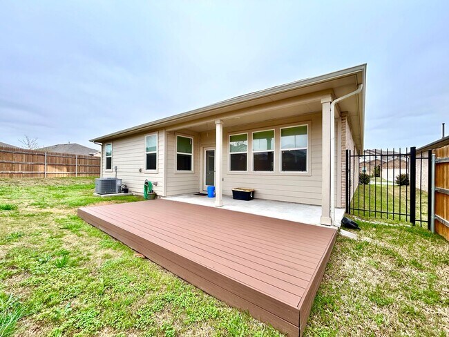 Building Photo - Light-Filled 4 Bedroom, 2 Bath Home with Deck & Fenced Backyard