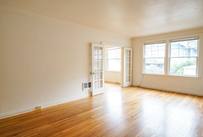 Building Photo - Ladd's Addition: Sunny Studio with Hardwoods + Lovely Architectural Appeal!