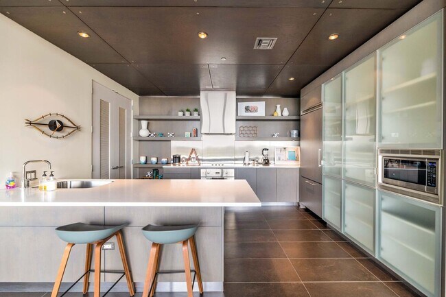 Building Photo - Rates Vary: $6,495 - $7,995