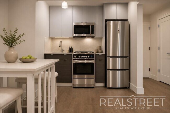 Foto del edificio - Stunning NEW 1 BED in PLG!