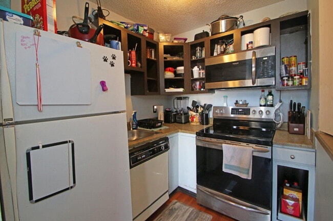 Building Photo - "Rent a floor in this 4-Bedroom Furnished ...