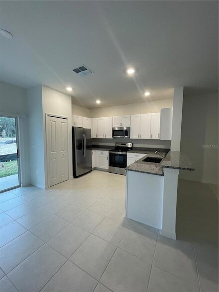 Foto del edificio - 10114 Honey Hammock Wy