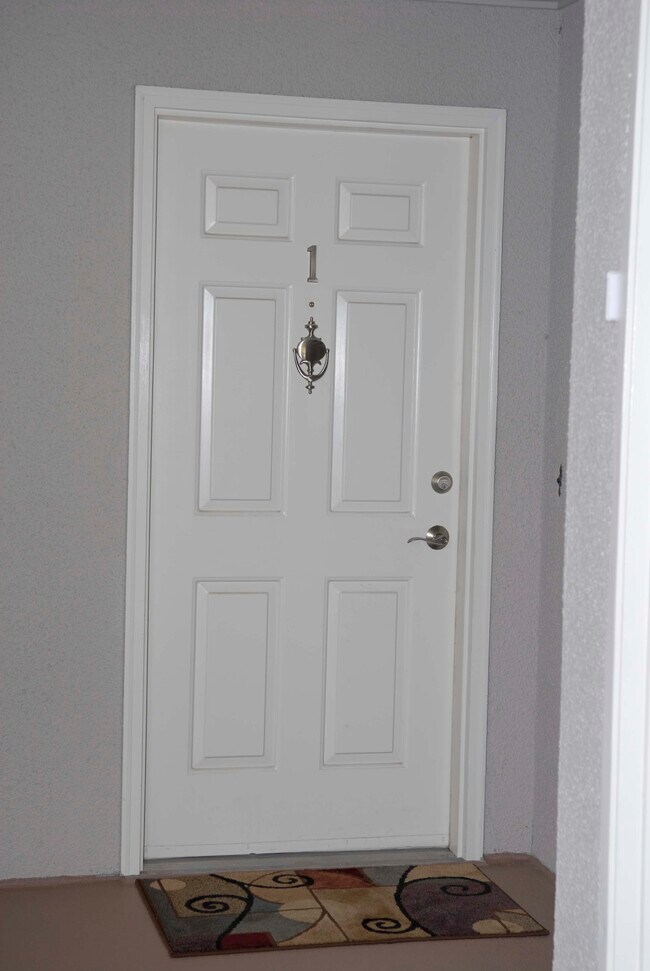 Door to Unit #1 - 11430 99th Pl NE