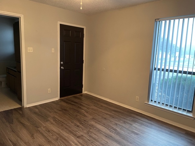 one bedroom with wood flooring (bedroom) - Ashley Oaks Apartments