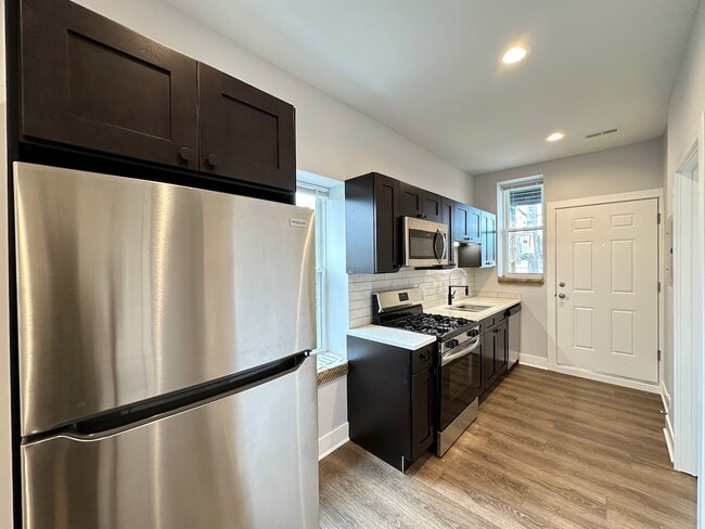 Building Photo - 4411 N Kimball Ave