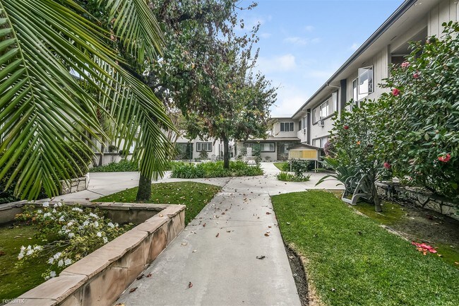 Foto del edificio - 2 br, 1 bath Apartment - Palms Apartments 5