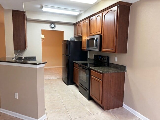 Photo - Spacious 2 Bed 2 Bath with Office/ Den House