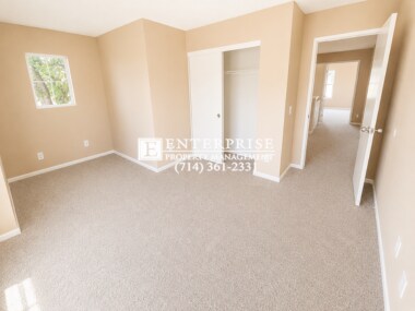 Building Photo - 4-Bed Home in Gated Tustin Grove with Private Patio & Pool Access