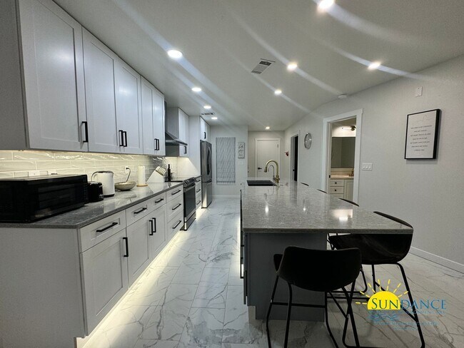Building Photo - FURNISHED Waterfront Townhouse in Desirabl...
